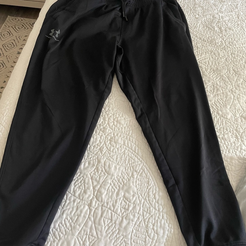 3 Lightly worn XL under armor joggers.. 1 black 2 grey